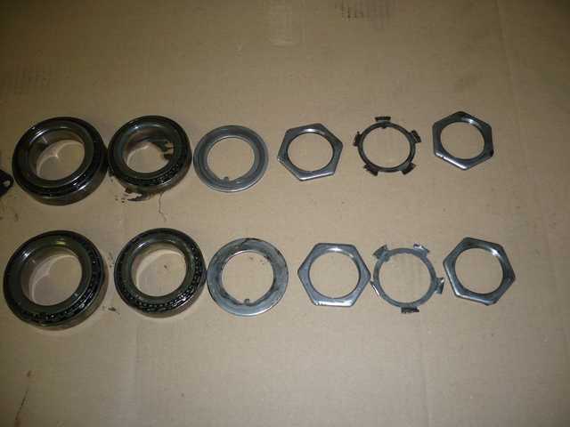 Front wheel bearings and lock nuts.JPG