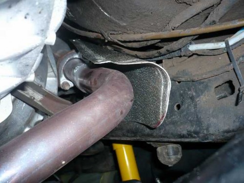 Manifold downpipe heatshield driver side 1.JPG