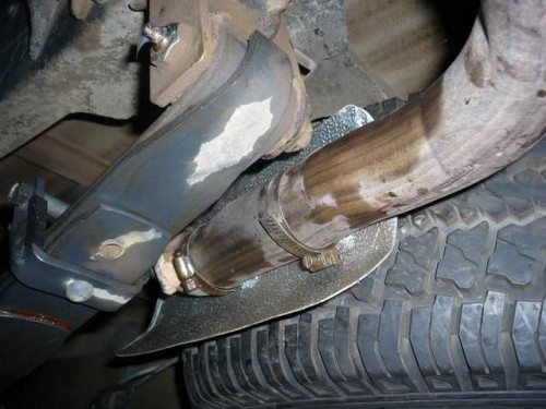 Spare tyre exhaust heat shield 2.JPG