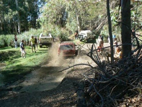 Cindy tackles a really nasty mud hole... we had to pull the Jeep out backwards... this girl didn't stand back for the boys!