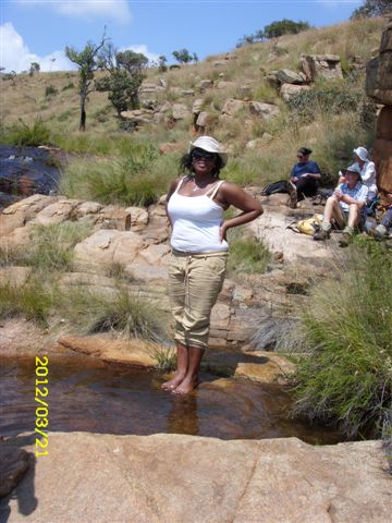 Enjoying the cool water, still smiling.