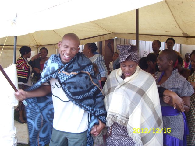 Dr Long with his younger sister, the bride