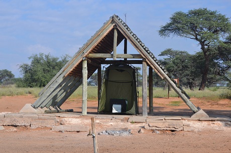 The shower and porta-potty tent