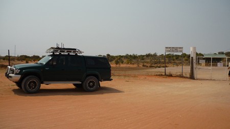 Crossing The Dingo Gate at Cameron Corner