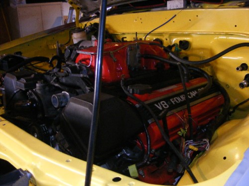 the yellow firewall with th red V8 in place