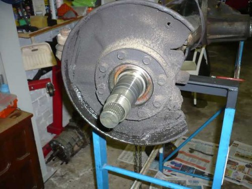 Brake disk and hub removed showing axle stub.JPG