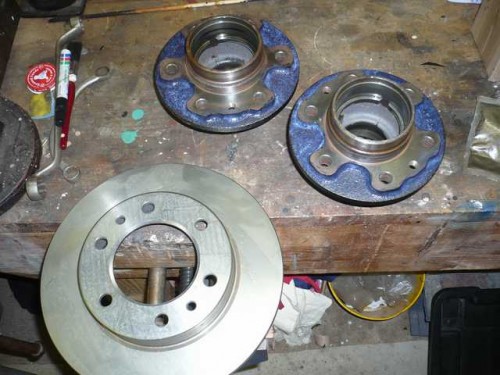 Wheel bearing hubs cleaned up and rust treated.JPG
