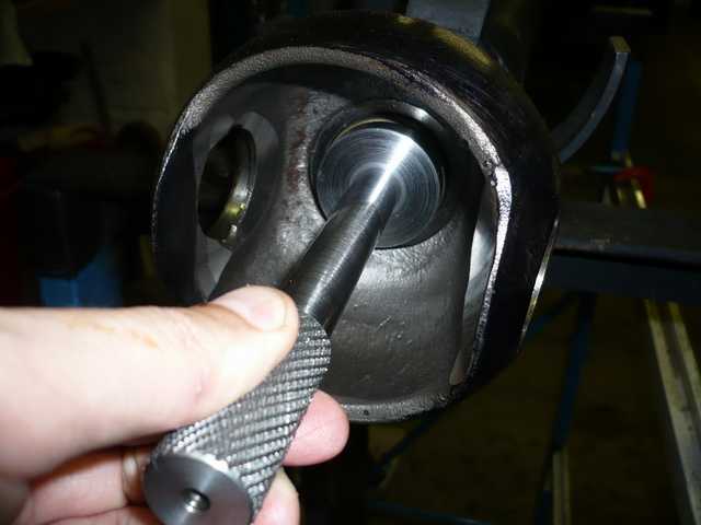 Oil seal being inserted into axle with tool.JPG