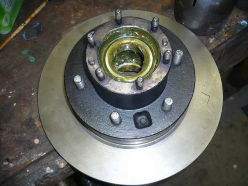 Outer wheel bearing installed and greased.JPG