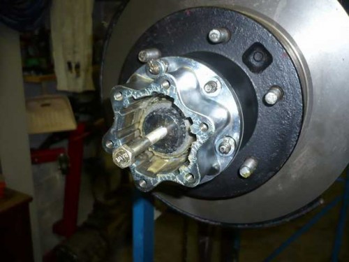 Fitting snap ring to shaft stub.JPG