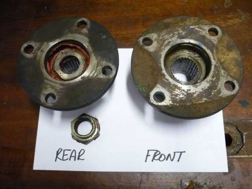 Rear and front transfer case output flanges.JPG