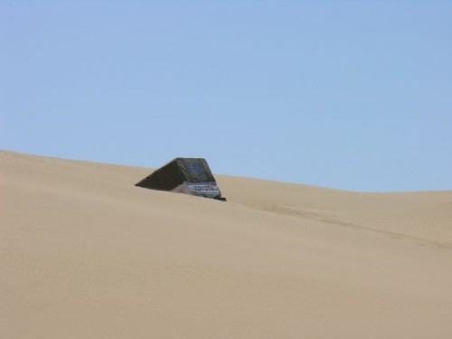 Looks like a cruiser got swallowed by a dune