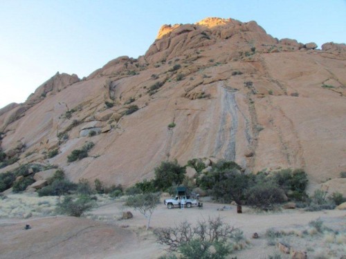 Camp at the foot of a massive granite peak at  Spitzkoppe
